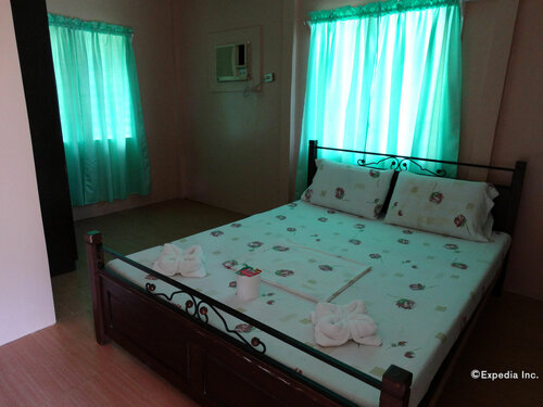 Punta Del Sol Beach Resort, Забронировать Курортный отель Самал Samal - Island Garden City of Samal