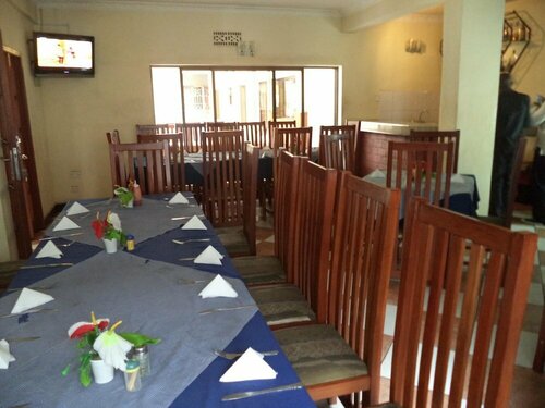 Meru House Inn, Забронировать Отель Сокон Аруша
