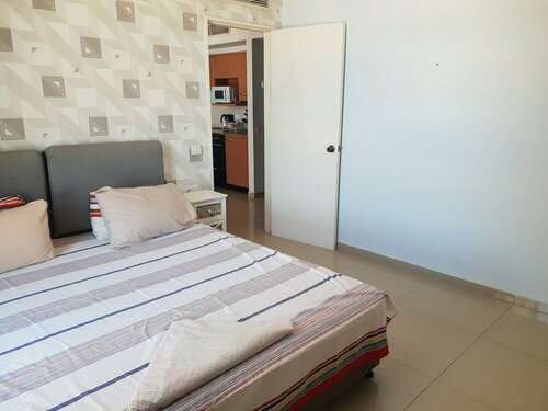 One Bedroom and One livingroom Apartment with full kitchen and full bath, Забронировать Апартаменты/квартира Отели Хайфы с бассейном, Бассейн