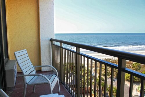The Caravelle Resort, Забронировать Курортный отель Гранд-Странд Миртл-Бич, рядом с Cane Patch Par 3 &amp; Driving Range
