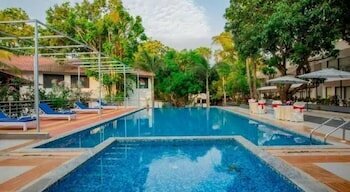 The Byke Retreat - Royal Pearl - Pan India Pure Veg Hotel Chain, Забронировать Отель Бизнес-отели Анжуна, 4* 5*
