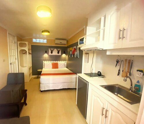 Little Norway Guesthouse - Mactan Cebu International Airport, Забронировать Гостевой дом Гостевые дома Себу, Гостевой дом