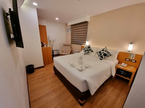 Alvea Hotel, Rezerwuj Hotel Hotele w Puerto Princesa City z parkingiem, w pobliżu Immaculate Conception Cathedral, Parking