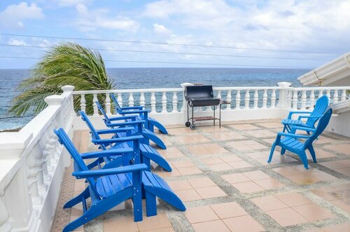 By The Sea Guest House, Забронировать Гостевой дом Сан-Андрес Сан-Андрес-и-Провиденсия