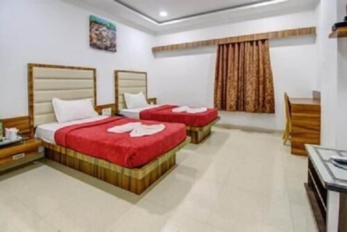 Hotel Caravan, Забронировать Отель Unjha штат Гуджарат