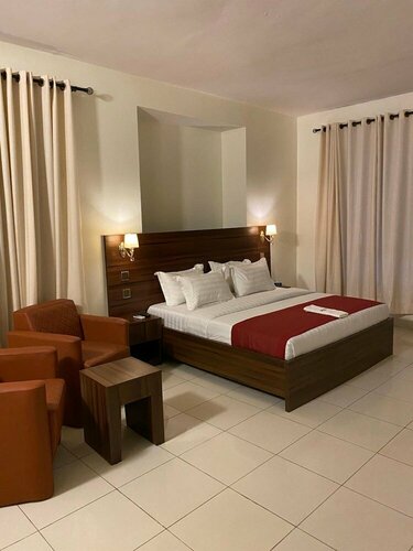 Posh Hotel and Suites Victoria Island, Забронировать Отель Недорогие отели Лагоса, рядом с Пляж Bar Beach, недорогие