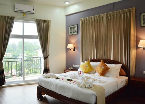 Nwe Waddy Hotel Pyin Oo Lwin, Rezervați Hotel Hoteluri în Pyinoolwin cu parcare, aproape de Purcell Tower, Parcare