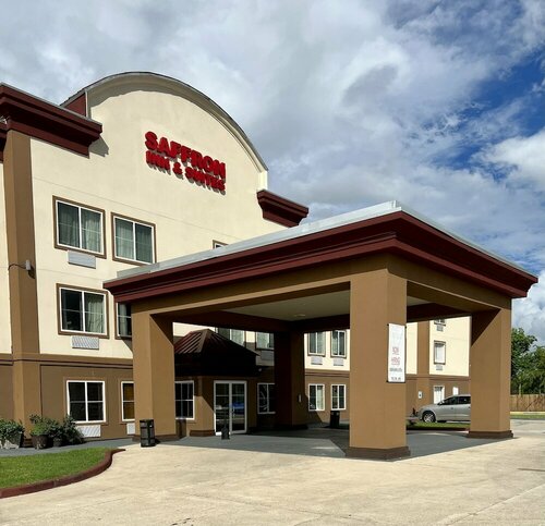 Saffron Inn & Suites, Забронировать Отель Хоума Acadiana