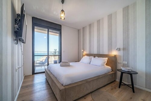 Stylish 1BR Beach-Front Apt w Sea View, Забронировать Апартаменты/квартира Апартаменты Хайфы, Апартаменты/квартира