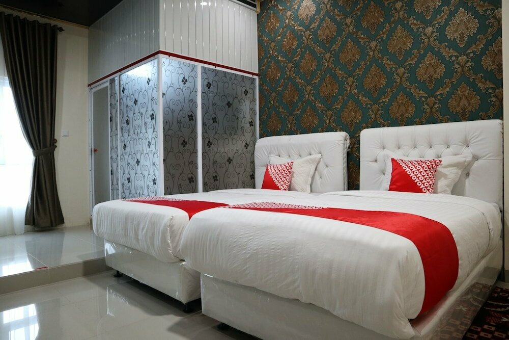 Oyo 1648 Penginapan Three Joye