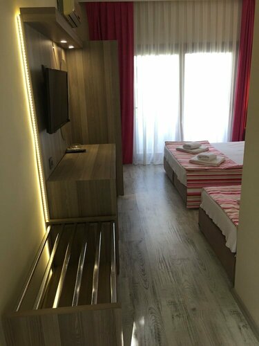Ali's Hotel Beach, Забронировать Отель Ортакент Бодрум