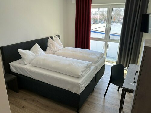 Hotel Stahltower, Забронировать Отель Фризойте Oldenburger Muensterland