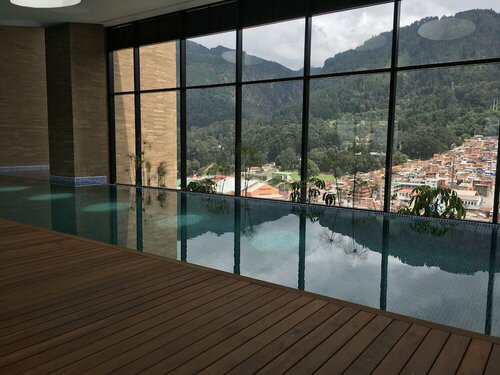 Enjoy In Bogotá, Забронировать Отель Богота Колумбия, рядом с Небоскреб Torre Colpatria