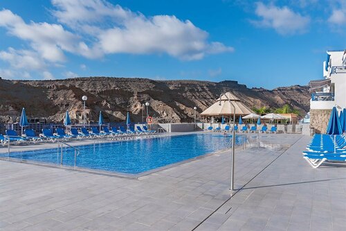 House With one Bedroom in Taurito, With Wonderful sea View, Shared Pool and Balcony, Забронировать Дом для отпуска Таурито Гран-Канария Юг
