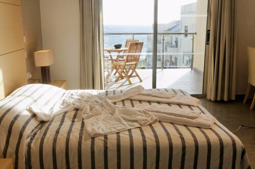 Capital Coast Resort And Spa, Забронировать Курортный отель Пафос район Пафос