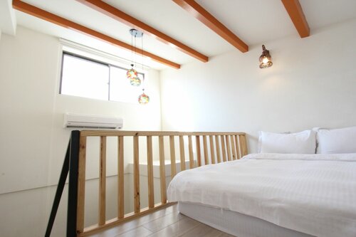Windhouse B&B - Tainan Room, Забронировать Отель «постель и завтрак» Тайнань Taijiang National Park