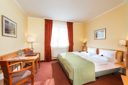 Hotel Godewind, Забронировать Отель Варнемюнде 