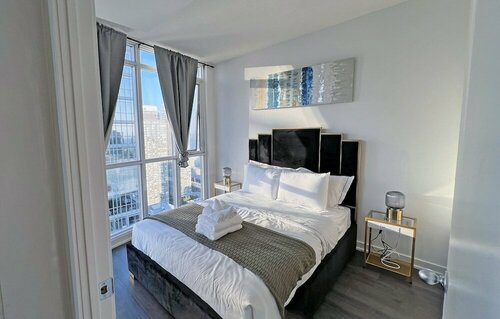 Nge Stays - Downtown Suite Lake View, Забронировать Отель Отели Торонто с парковкой, рядом с Native Stone Art, Парковка