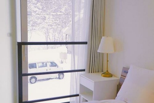Niseko White Villas1, Забронировать Отель Отели в центре Нисеко, в центре
