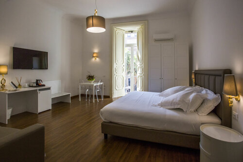 Napoli Class Luxury Rooms & Suites, Забронировать Отель Неаполь Кампания, рядом с Галерея Толедо