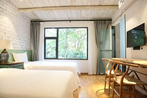 7Days Inn Chengdu Sichuan Normal University Chenglong Campus, Jingji Harbor, Prenota Hotel Hotel a Sichuan con parcheggio, Parcheggio