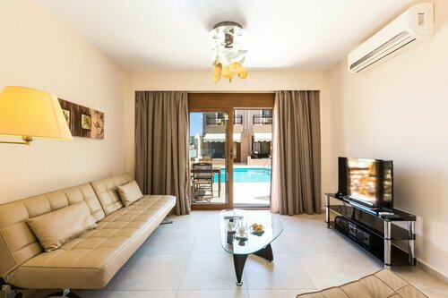 Pantheon Villas & Suites, Забронировать Отель Влихада Центральный Крит