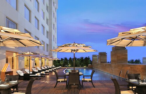 Four Points by Sheraton Hotel and Serviced Apartments Pune, Забронировать Апарт-отель Пуна штат Махараштра, рядом с Торговый центр Inorbit