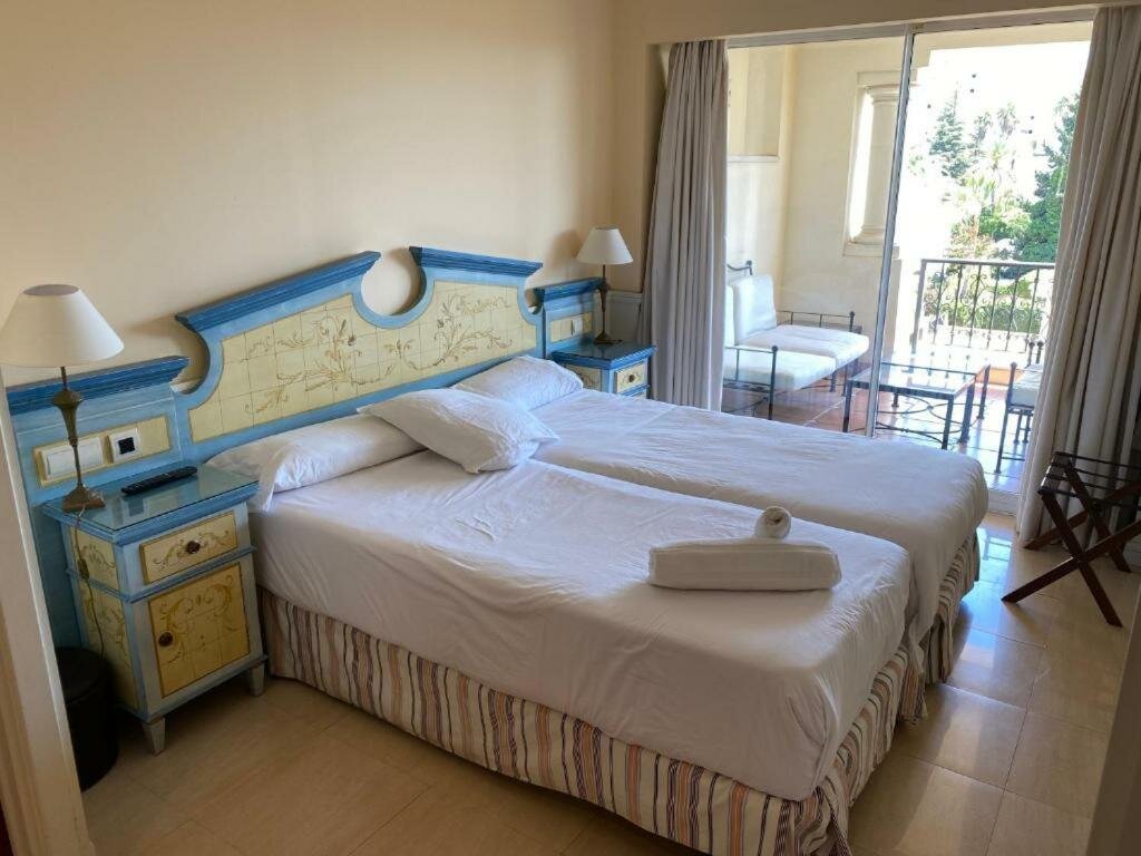 Apartamentos Guadalpin Boutique
