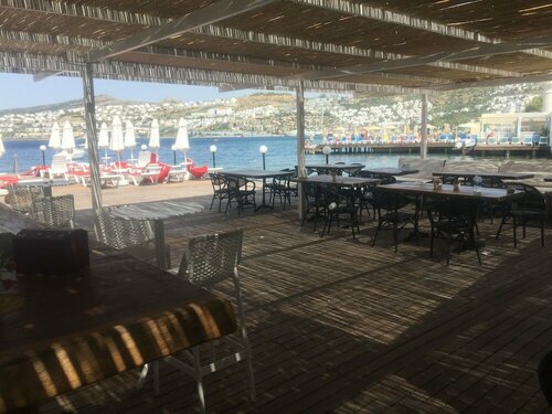 Estrella Beach Hotel, Забронировать Отель Гюндоган Бодрум