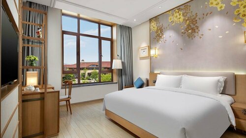 Holiday Inn Dalian Hot Spring By Ihg, Prenota Hotel Hotel a Dalian con piscina, Piscina