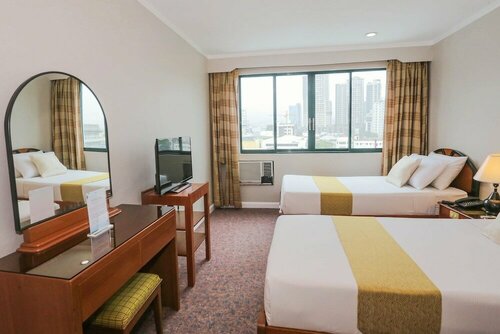 Holiday Plaza Hotel - Cebu, Забронировать Отель Отели провинции Себу 3 звезды, рядом с Торговый центр Ayala Center Cebu, 3*