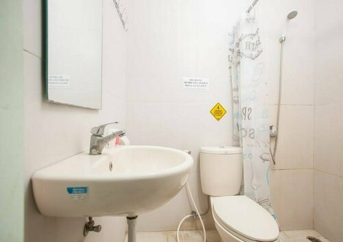 Budget Guest House Tunas Mandiri Jaya, Prenota Affittacamere Hotel a Malang con parcheggio, vicino a Gajayana Stadium, Parcheggio