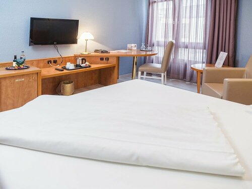 Golden Tulip Bielefeld, Забронировать Отель Билефельд Teutoburg Forest, рядом с Центральный железнодорожный вокзал Билефельда
