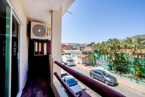 OYO Hotel Posada Lys, Zihuatanejo, Забронировать Отель Недорогие отели Сиуатанехо, рядом с Пляж Ла Ропа, недорого