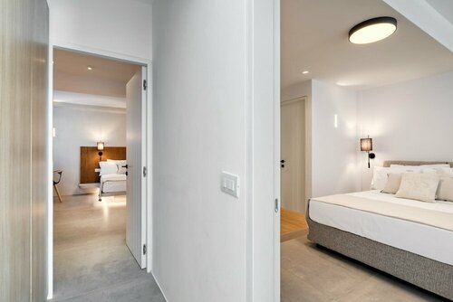 Panormos Bay Suites, Забронировать Гостевой дом Панормос-Миконос остров Миконос, рядом с Пляж Гиалудиа