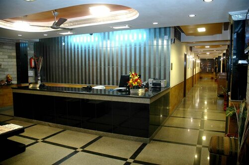 Tavern Business Hotel, Забронировать Отель Нью-Френдс-Колони 