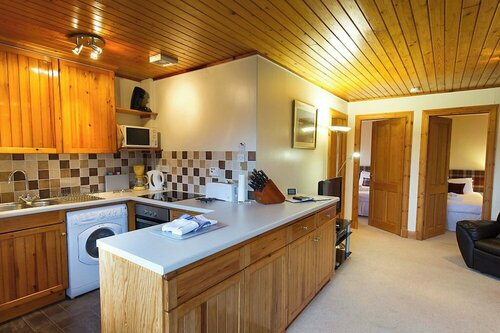 Eagle Lodge with stunning loch and mountain view, Забронировать Дом для отпуска Крианларич Центральная Шотландия