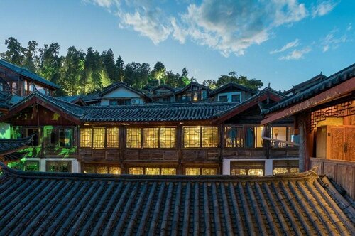 Lijiang Sunshine Nali Inn, Prenota Hotel Yulong-Nasi Autonomous District Lijiang