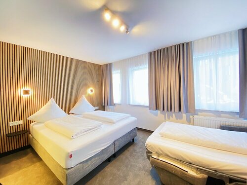 Hotel Xenia Flensburg, Забронировать Отель Фленсбург земля Шлезвиг-Гольштейн, рядом с Фантомента