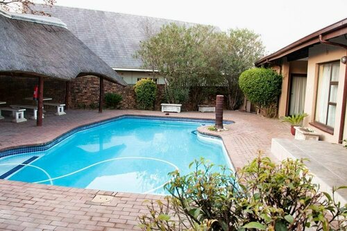 Woodpeckers Inn Guest House, Buchen Sie Pension Kempton Park Gauteng