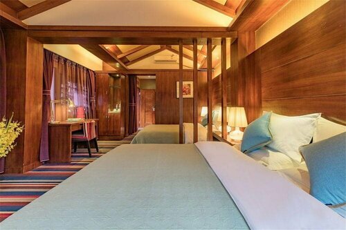 Lijiang Sunshine Nali Inn, Prenota Hotel Yulong-Nasi Autonomous District Lijiang