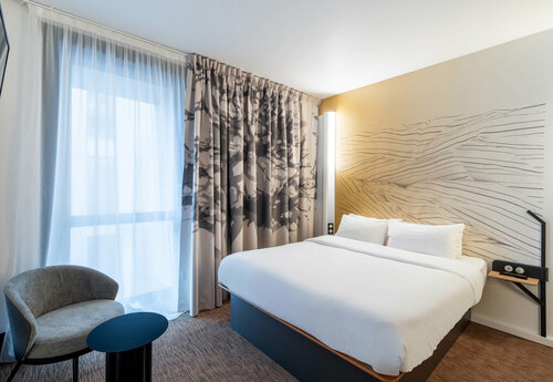 B&B HOTEL Lille Villeneuve dAscq Grand Stade 3 étoiles, Забронировать Отель «постель и завтрак» Вильнёв-д'Аск О-де-Франс, рядом с Центральная школа Лилля