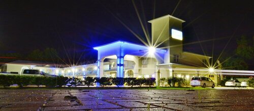 Scottish Inn and Suites Alvin, Book Mini-hotel Hoteller i Houston med parkering, Parkering