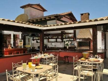 Pousada Casa do Catavento, Забронировать Отель Феррадура Бузиус