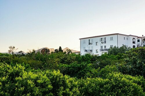Le Residenze del Baia Marina, Забронировать Апартаменты/квартира Отели в центре Орозеи, в центре