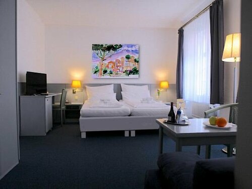Altstadthotel Augsburg, Забронировать Отель Аугсбург Романтическая дорога, рядом с Brechthaus