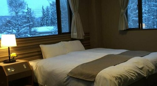 Hakuba Landmark Iwatake Lodge, Забронировать Гостевой дом Отели Горнолыжного курорта Хакуба с парковкой, Парковка