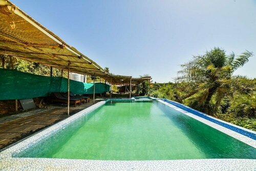 Capital O 30548 Padma Cottages, Boek Hotel Goa hotels met ontbijt, Ontbijt