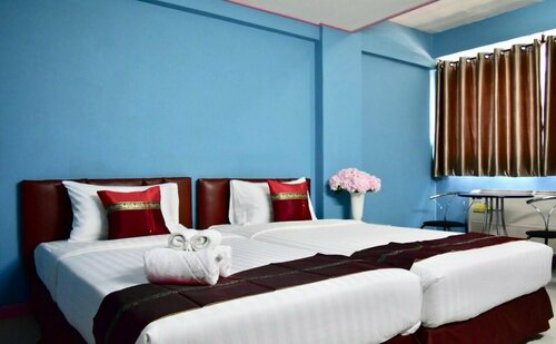 Happyland Mansion, Rezervovat Hotel Hotely v Central Thailand se snídaní, Snídaně