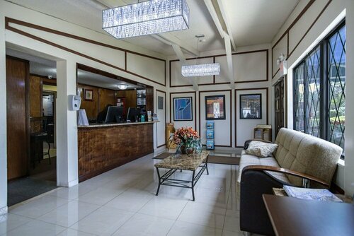 Spinnaker Inn of Naples, Забронировать Отель Нейплс Southwest Florida